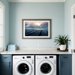 An Art Wall Room Mockup generated with AI for Print On Demand Seller. The mockup features a Coastal Style Laundry Room with a framed photography print of a cloudy sunset over a Caribean Sea on the wall
