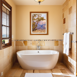 An Art Wall Room Mockup generated with AI for Print On Demand Seller. The mockup features a Mediterranean Style Bathroom with a framed photography print of the Grand Canyon on the wall