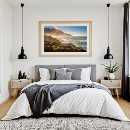 An Art Wall Room Mockup generated with AI for Print On Demand Seller. The mockup features a Scandinavian Style Bedroom with a framed photography print of the Pacific Coastline on the wall
