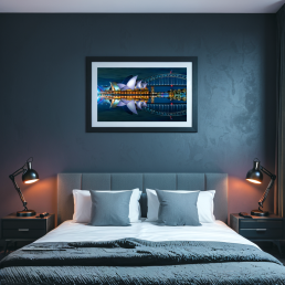 An Art Wall Room Mockup generated with AI for Print On Demand Seller. The mockup features a Cyberpunk Style Bedroom with a framed photography print of the vivid Sydney Opera and its reflection in the water at night on the wall