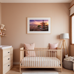 An Art Wall Room Mockup generated with AI for Print On Demand Seller. The mockup features a Japandi Style Nursery room with a framed photography print of the Chureito Pagoda and Mount Fuji at sunset during Sakura hanged on the wall